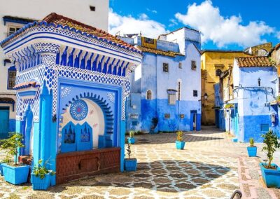 Colorful blue streets of Chefchaouen nestled in the Rif Mountains, a scenic stop on a northern Atlas itinerary.