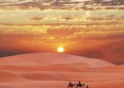 Scenic view of the sand dunes in Merzouga desert under a clear sky Atlas itinerary
