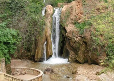 View of Sefrou’s medina and nearby waterfall, a peaceful Middle Atlas stop on an Atlas itinerary.