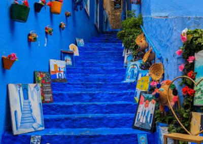 Colorful blue streets of Chefchaouen nestled in the Rif Mountains, a scenic stop on a northern Atlas itinerary.