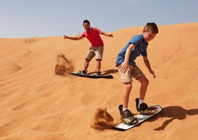 Camel caravan crossing the dunes of Merzouga at sunset, a breathtaking endpoint on an Atlas itinerary.
