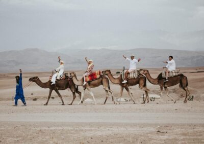 Scenic view of Agafay Desert with the Atlas Mountains in the distance, an accessible desert stop on an Atlas itinerary.